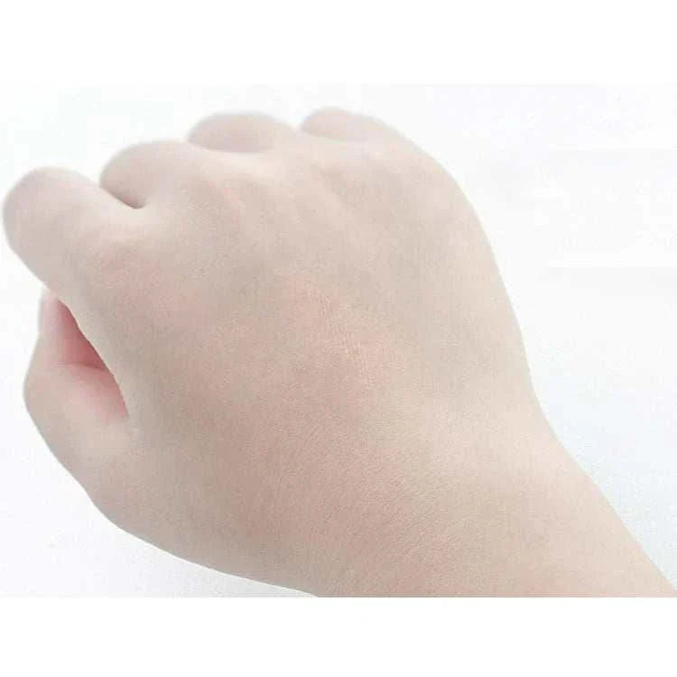 Close-up of a hand showing clear, invisible eyelid lifting tape applied for a natural, discreet eyelid lift.
