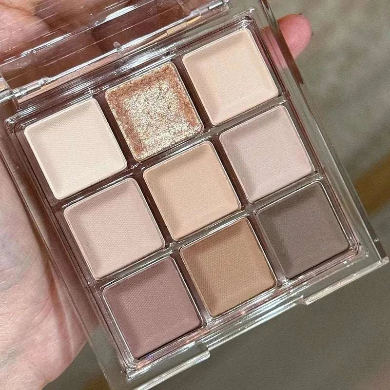 Black Pink Smoky Eye shadow palette with matte and pearlescent neutral shades in a compact case