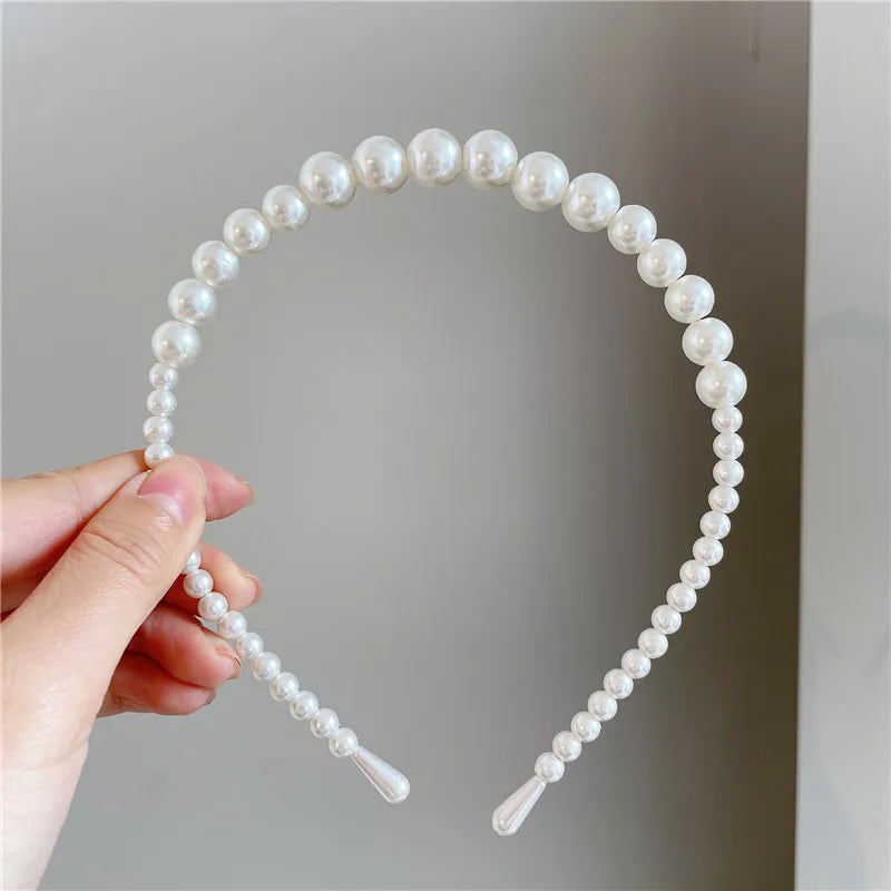 Modyle Full Pearl Hairband with elegant floral pearl design and elastic fit for women and girls