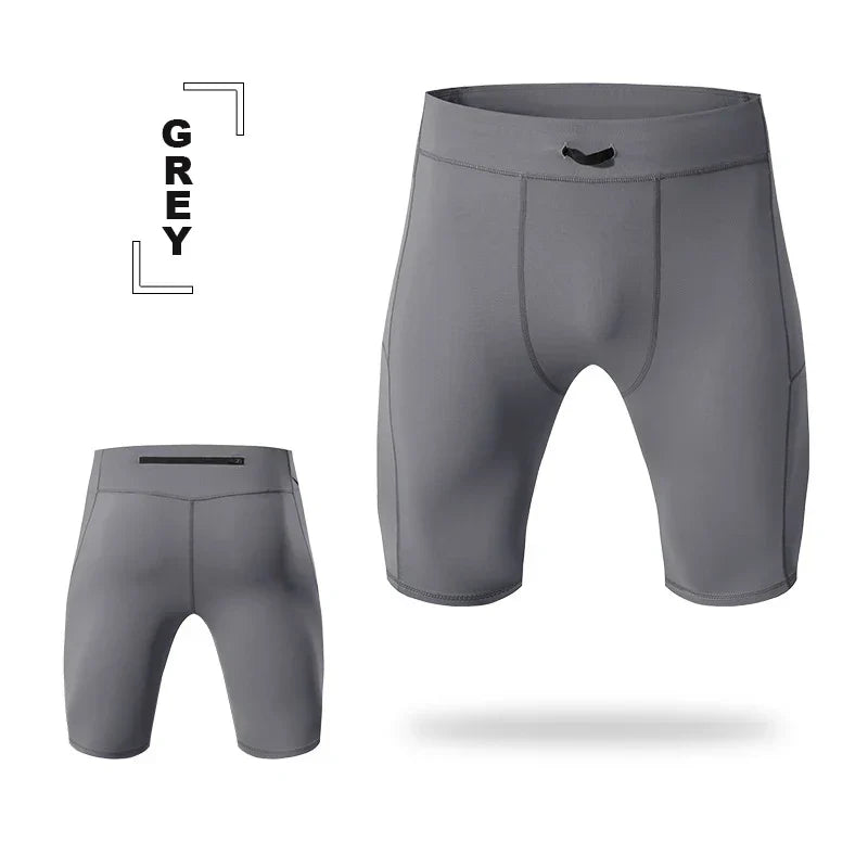 Grey compression shorts for men with quick-dry, breathable fabric and flexible fit for athletic performance