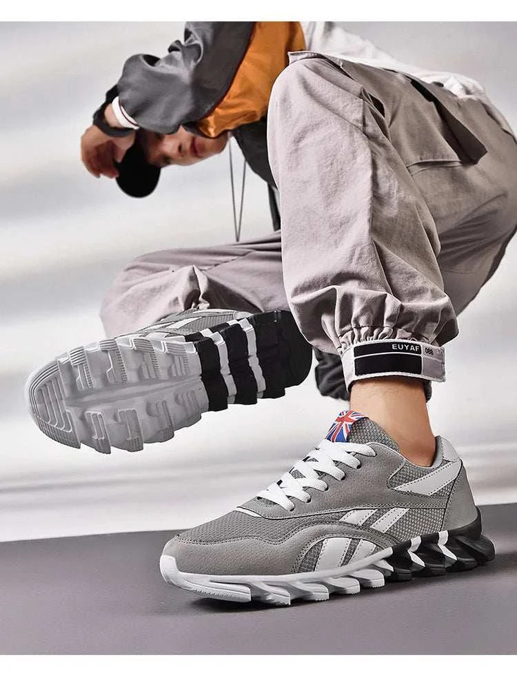 2025 new men's and women's running shoes in grey with breathable mesh upper, cushioned insole, and anti-slip outsole.