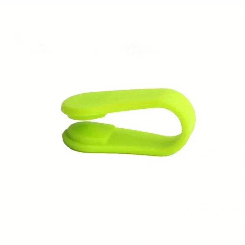 Compact green Finger Joint Tiger Point Massage Clip for hand acupressure and improved blood circulation