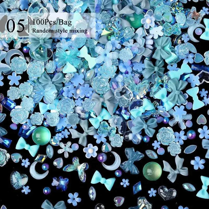 Various blue and iridescent rhinestones and nail art decorations for use with BORN PRETTY 10g Gel Nail Glue