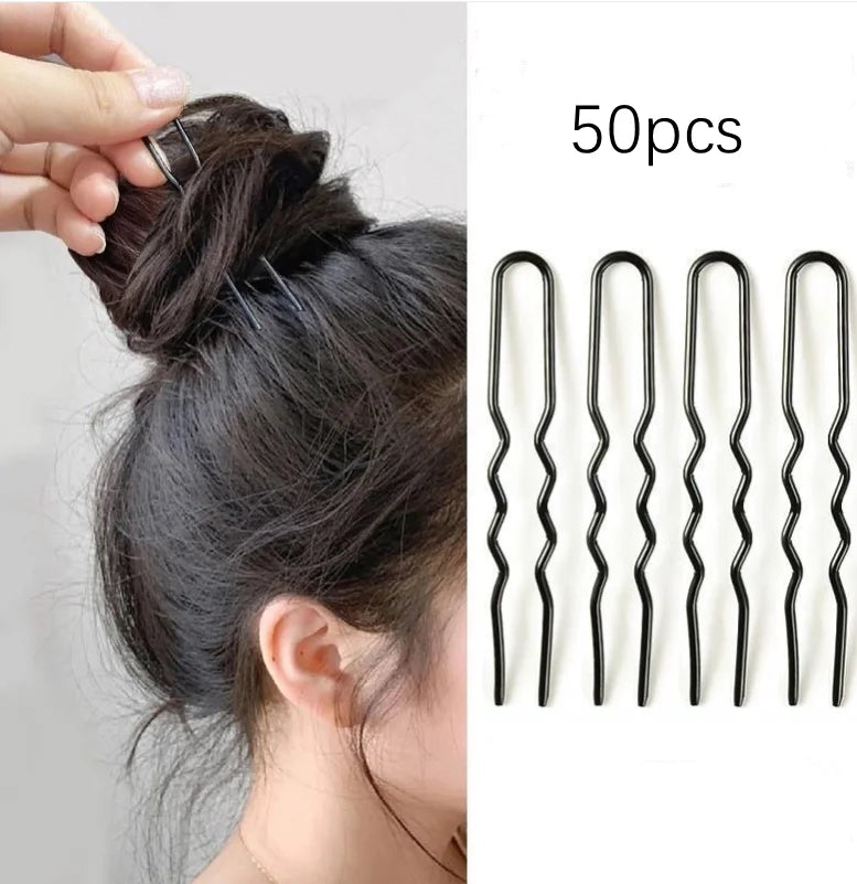 50pcs U-shaped metal hair pins shown in hand holding hair bun and close-up of waved grip pins for secure styling