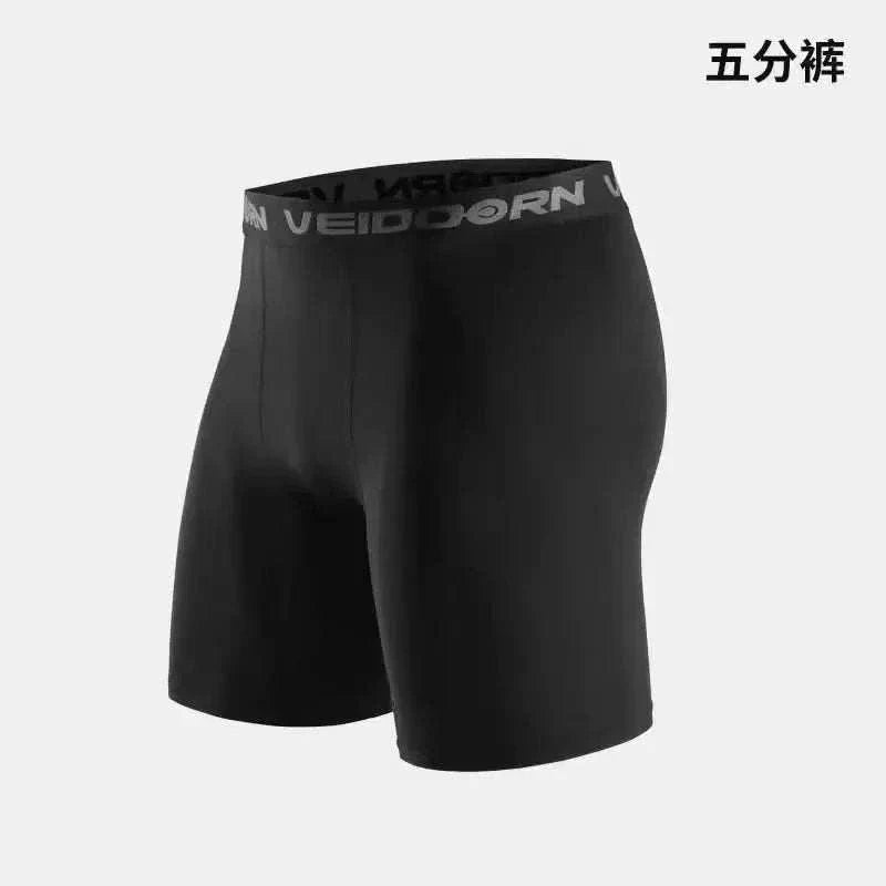 Black men's compression workout tights with branded waistband, designed for muscle support and moisture-wicking during exercise.