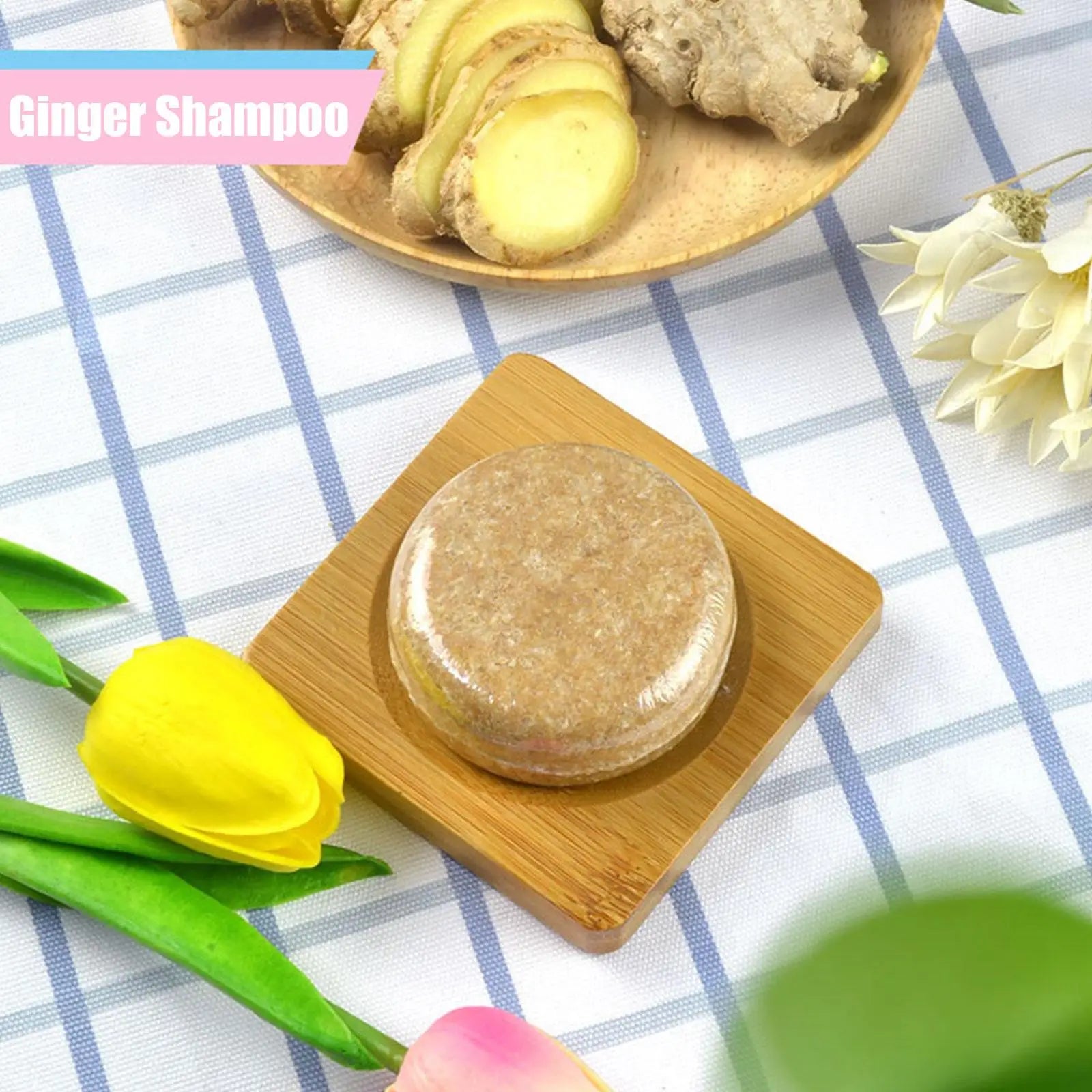 Ginger Polygonum Soap shampoo bar with natural ingredients on wooden dish and fresh ginger slices