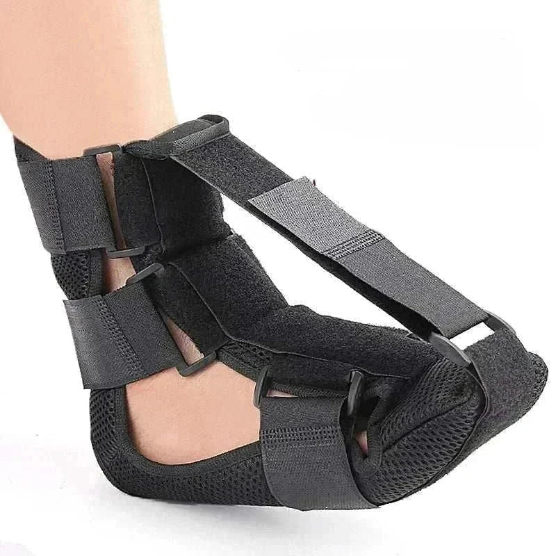 Black night splint for plantar fasciitis with adjustable straps for heel and arch support.