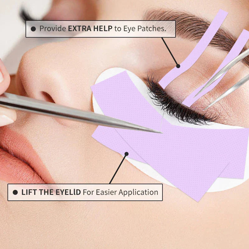 Close-up of eye with micropore eyelash extension tape applied for lifting eyelid and securing lower lashes during extension application