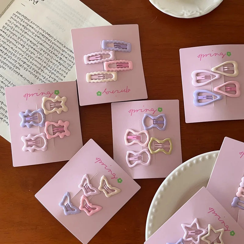 Set of 4pcs cute colorful geometric mini hair clips on pink cards for girls hair accessories