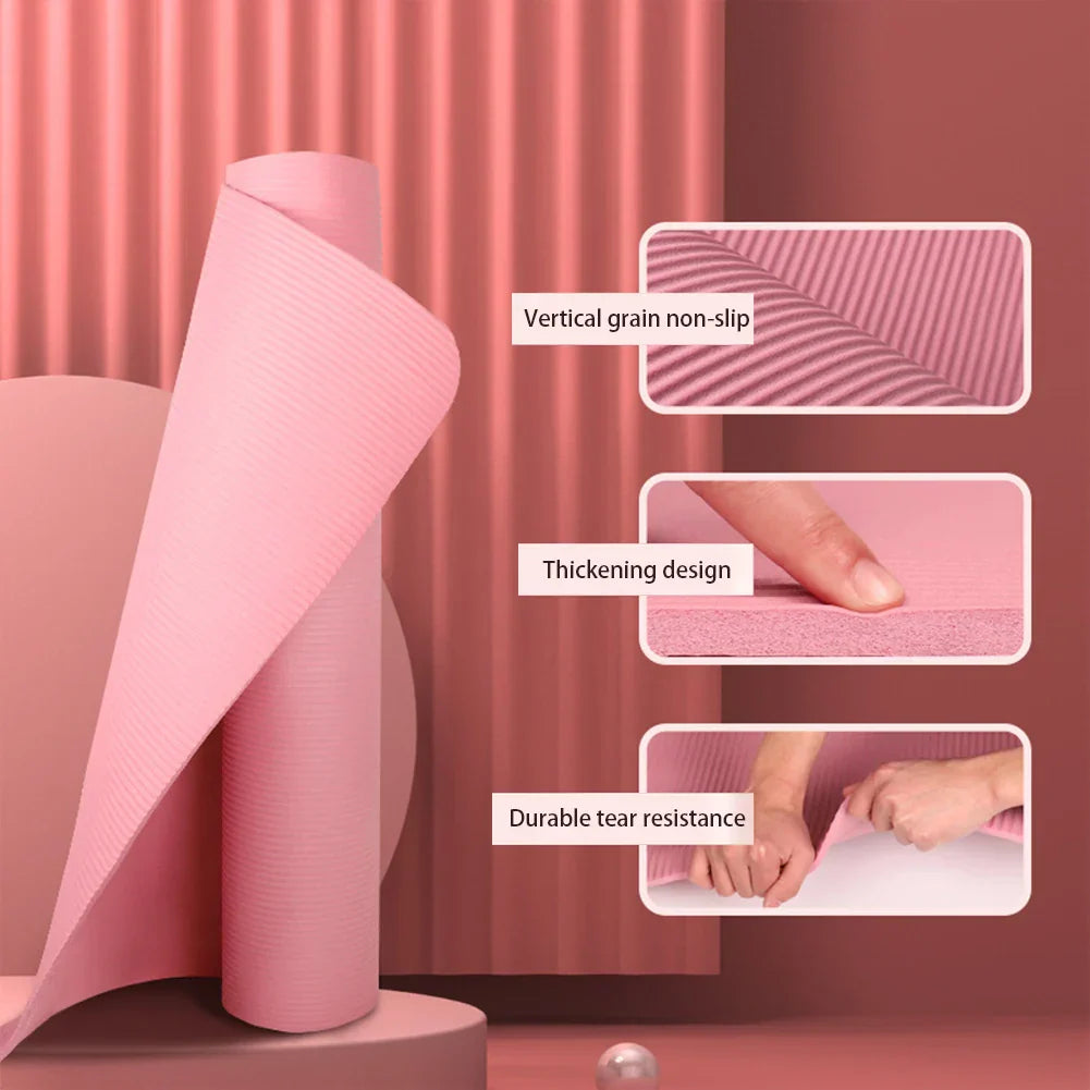 Pink non-slip yoga mat with vertical grain texture, thick cushioning, and durable tear-resistant material