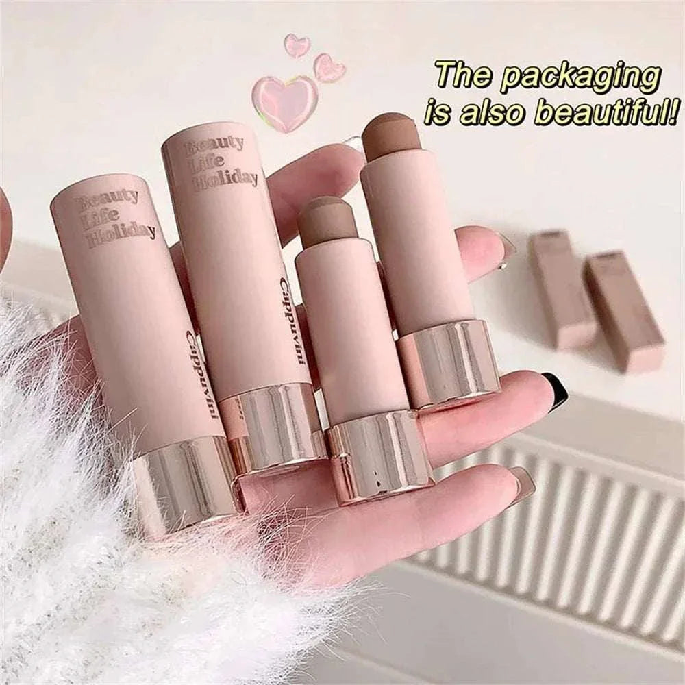 Moisturizing matte concealer contour sticks with sleek beige packaging held in hand for smooth, long-lasting makeup application