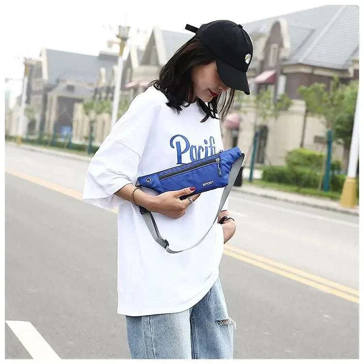 Woman wearing blue nylon waist and chest bag with adjustable strap on street, casual sporty style