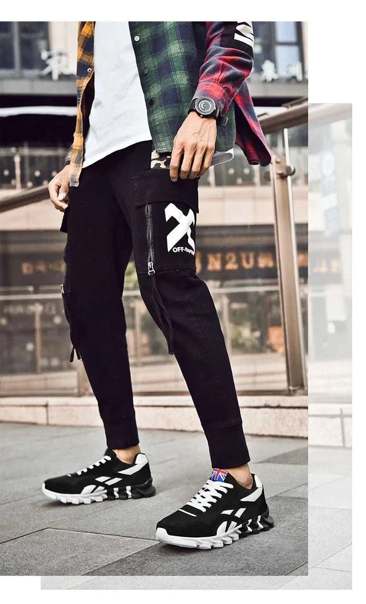 2025 New Men's & Women's running shoes black and white breathable mesh unisex design with anti-slip sole and cushioned insole worn outdoors
