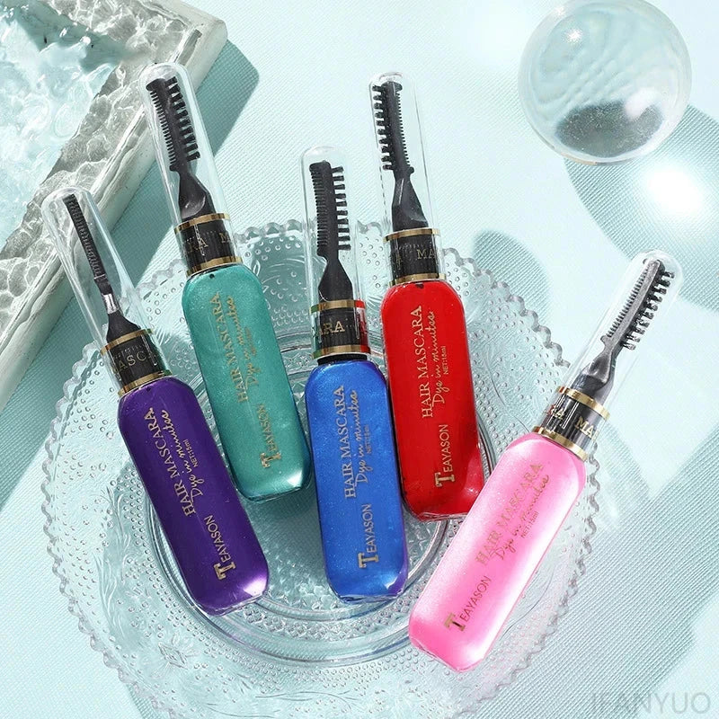 13 Colors One-Off Hair Color Mascara in vibrant purple, green, blue, red, and pink shades with brush applicators on a clear plate