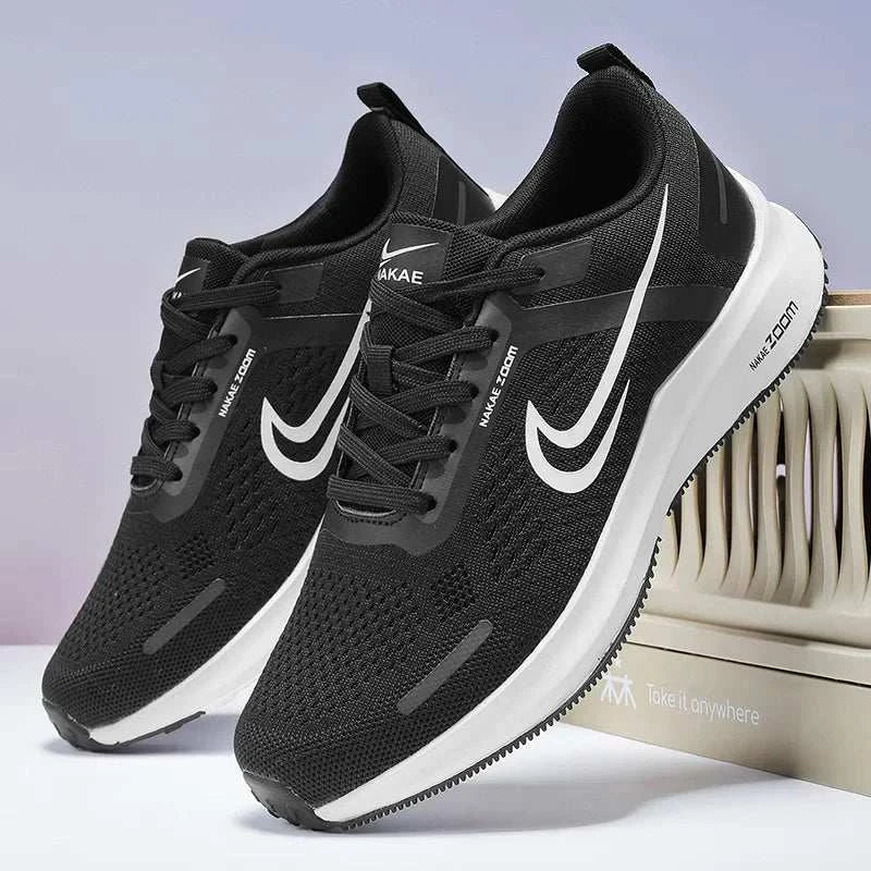 Black men's lightweight running shoes with breathable mesh, cushioned insoles, non-slip white soles, and sleek sporty design.