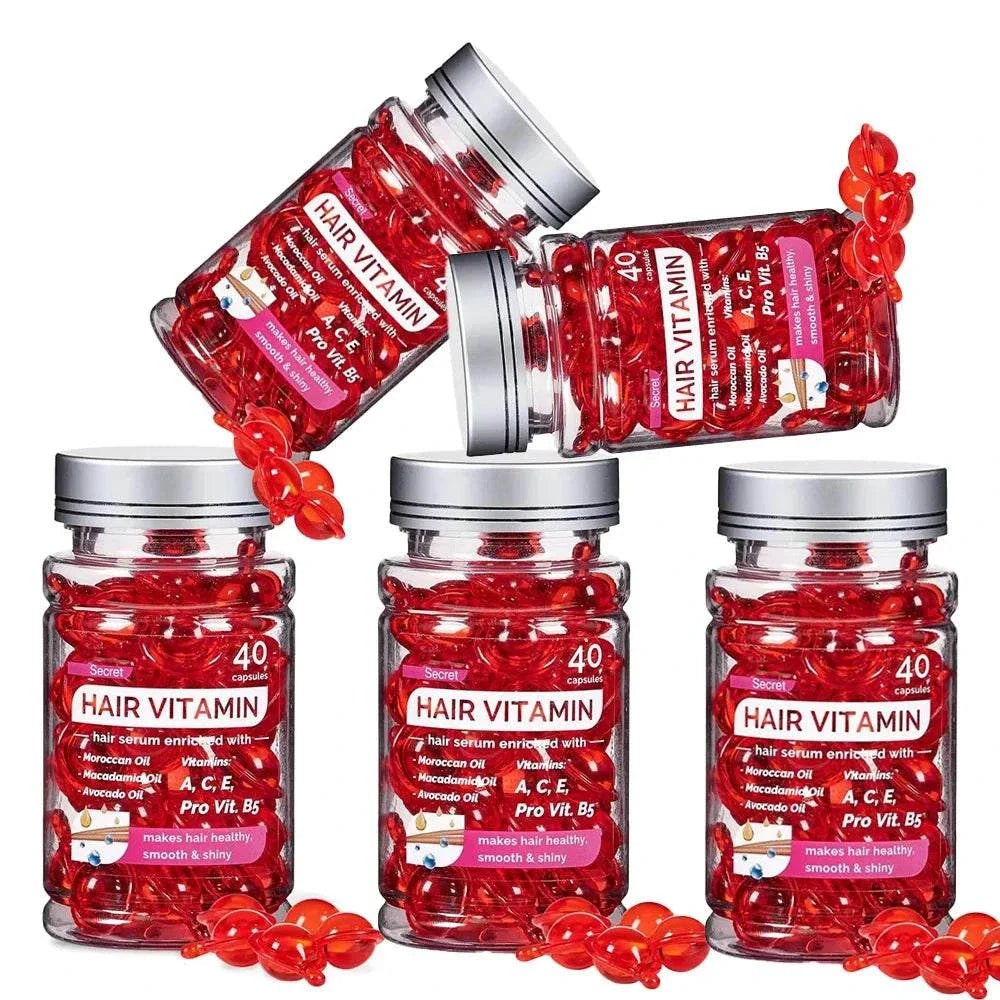 Bottles of Moroccan Agam Vitamin Oil Hair serum capsules enriched with argan oil and vitamins for hair repair and shine.