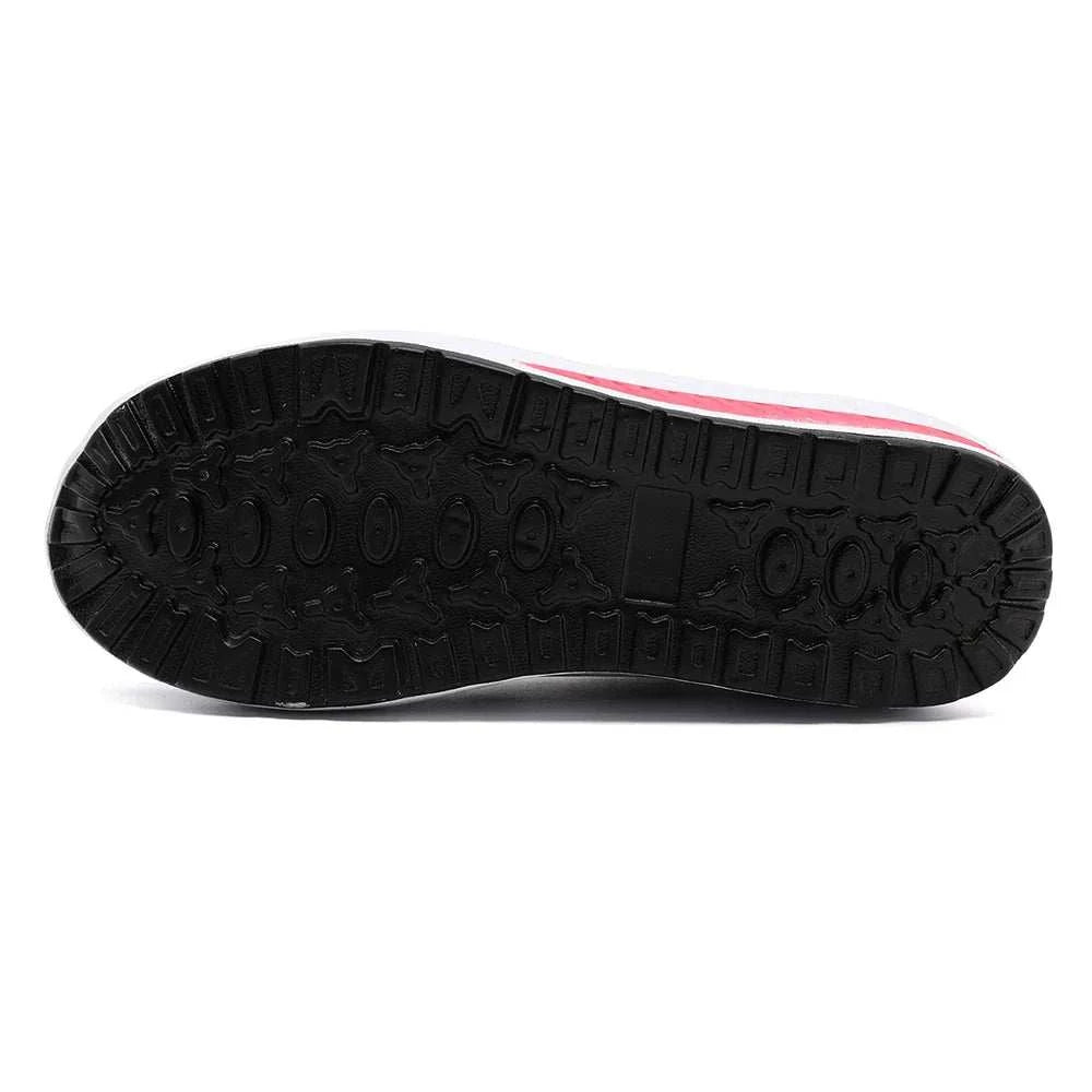 Sole view of breathable wedge heel sneakers with thick cushioned sole for shock absorption and durable outsole design
