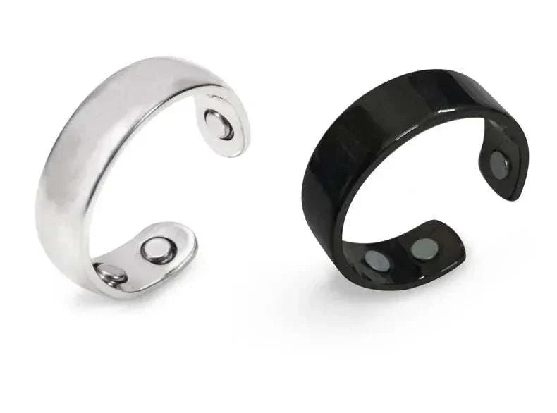 Pair of adjustable anti snoring device rings with built-in bio-magnets for magnetic therapy and acupressure sleep aid in black and silver colors.
