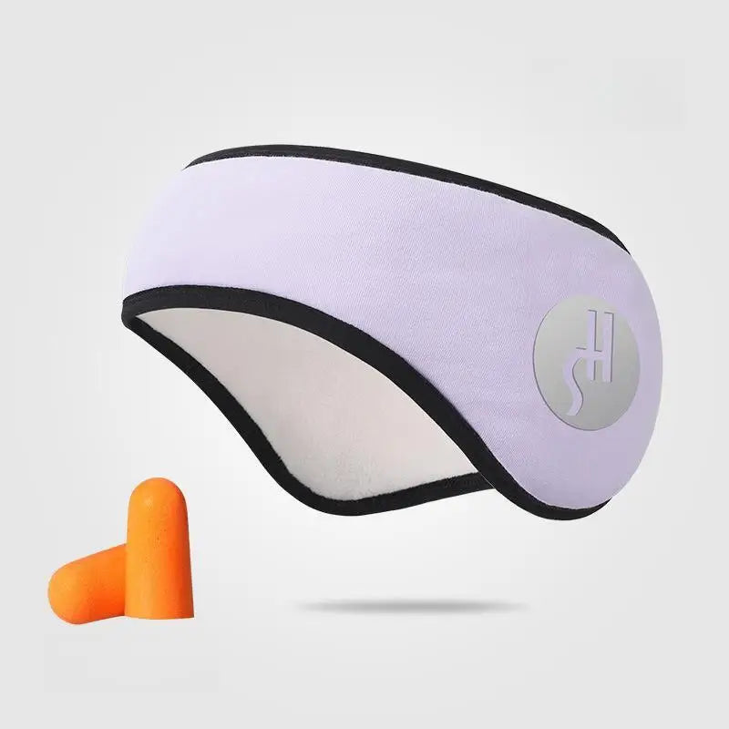 Adjustable lavender eye mask with black trim and orange noise-reducing sleep earplugs for light and sound blocking