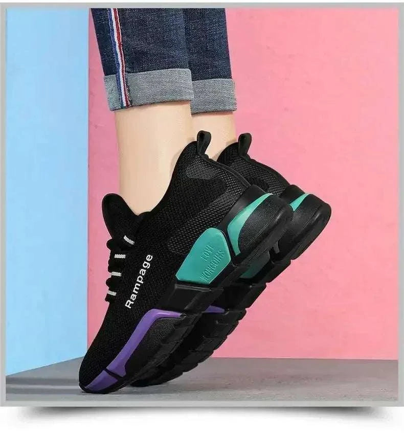 Black lightweight women's shoes with purple and teal accents, breathable mesh design, and secure lace-up closure for casual and sporty wear.