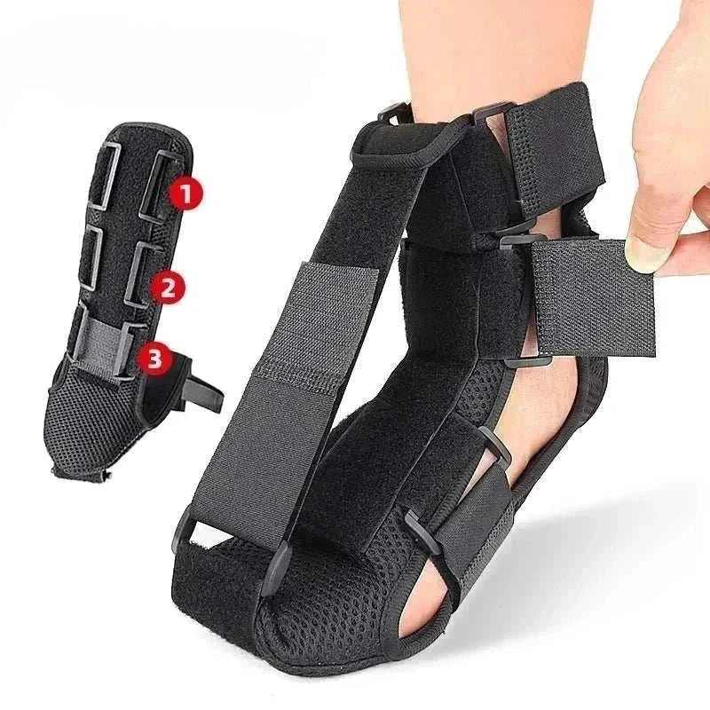Adjustable black night splint for plantar fasciitis with straps for foot and ankle support.