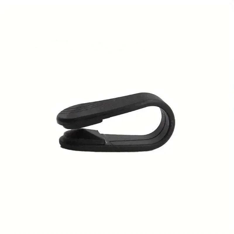 Compact black Finger Joint Tiger Point Massage Clip for targeted acupressure and improved blood circulation.