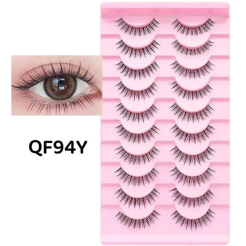 10 pairs natural manga full strip lashes on pink tray with close-up eye showing voluminous, anime-inspired fluttery look