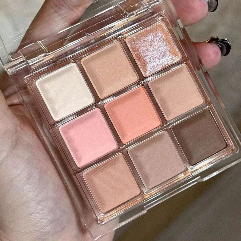 Black Pink Smoky Eye shadow palette with matte and pearlescent neutral pink and brown tones in a compact case