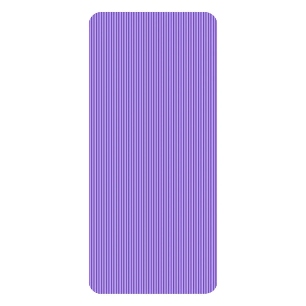 Purple non-slip yoga mat with textured surface for grip and thick cushioning for comfort