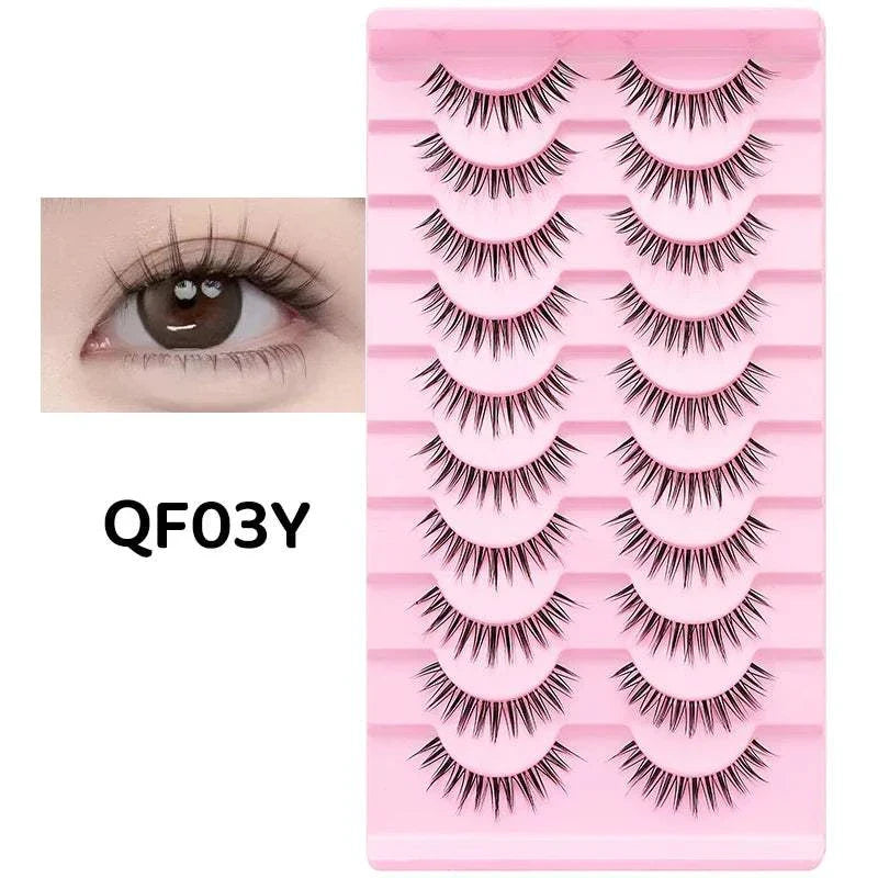 10 pairs of Natural Manga Full Strip Lashes in pink tray with close-up of eye showing natural voluminous anime-inspired look