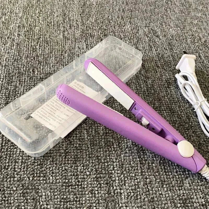 Compact purple mini flat iron with protective case and power cord for travel styling