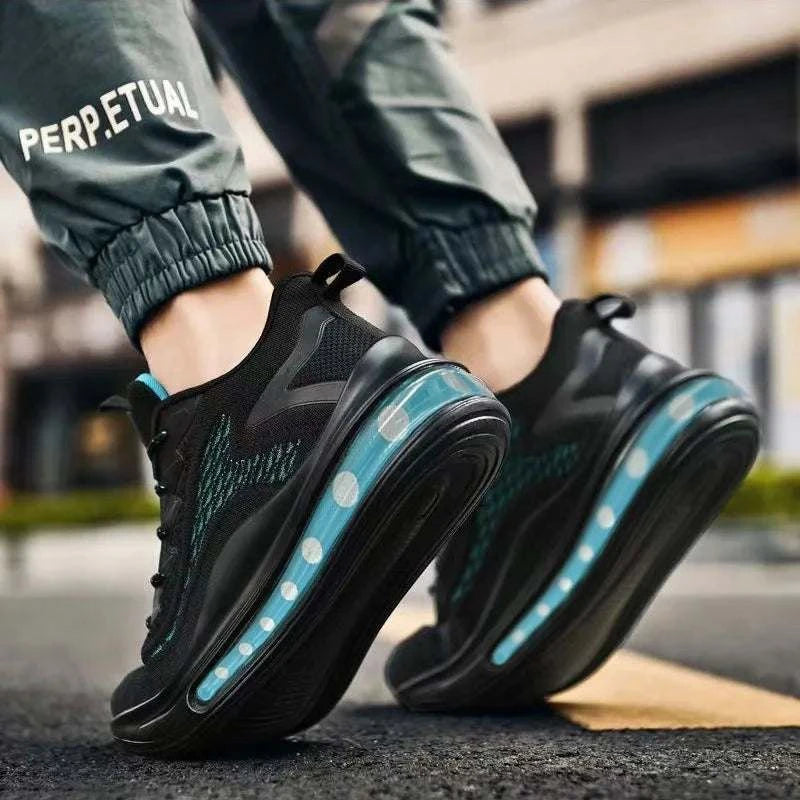 Black breathable unisex sneaker with blue air cushion sole and durable vulcanized rubber outsole for indoor and outdoor use