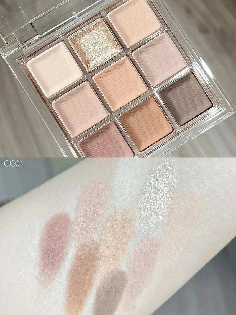 Black Pink Smoky Eye shadow palette with matte and pearlescent chocolate-inspired neutral shades and arm swatches