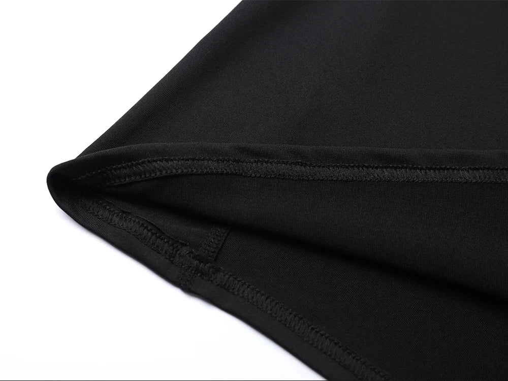 close-up of black Anime Jujutsu Kaisen compression t-shirt fabric and stitching detail