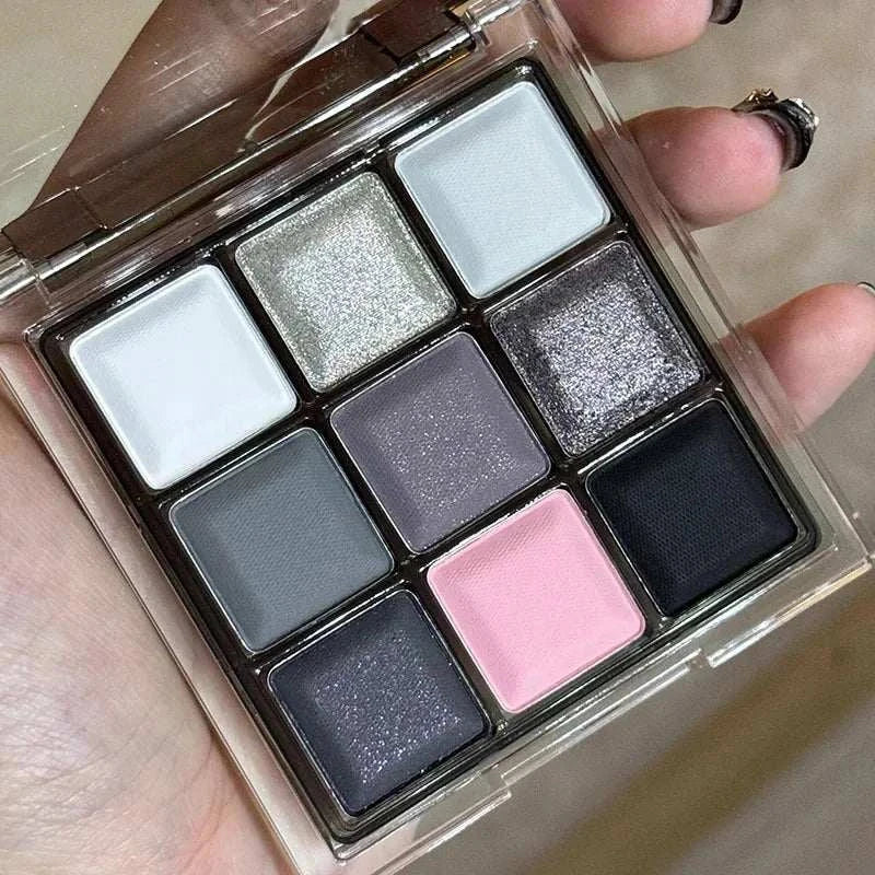 Black Pink Smoky Eye shadow palette with matte and pearlescent shades in black, pink, gray, and shimmer tones for versatile smoky eye looks