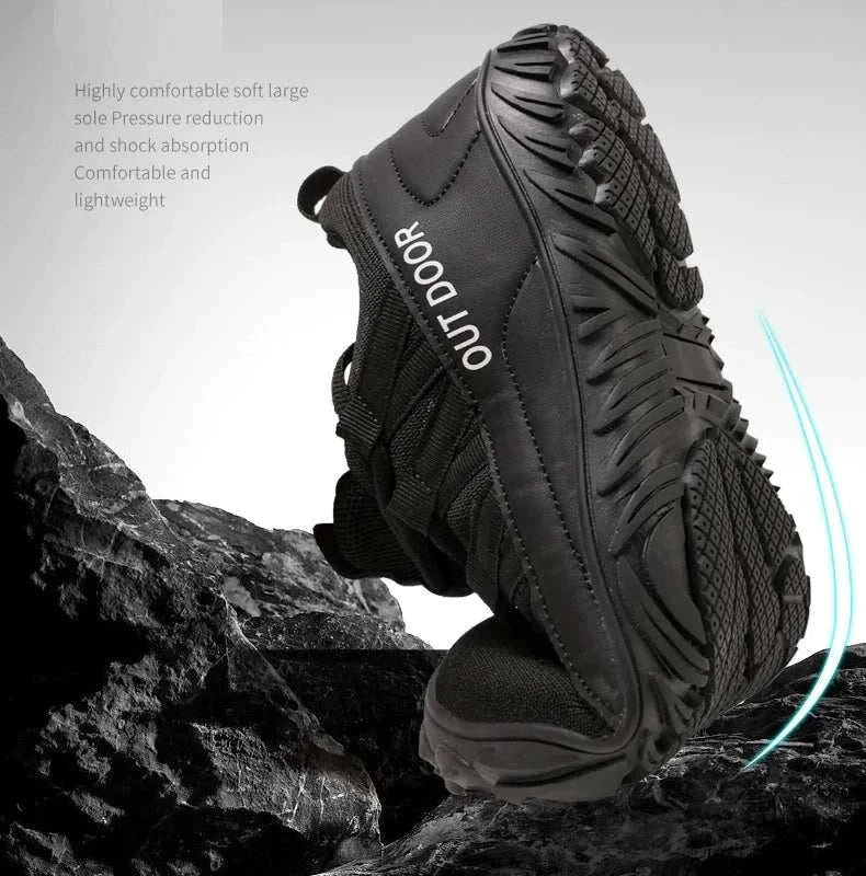 Black new hiking shoes with durable traction sole and lightweight design on rocky surface