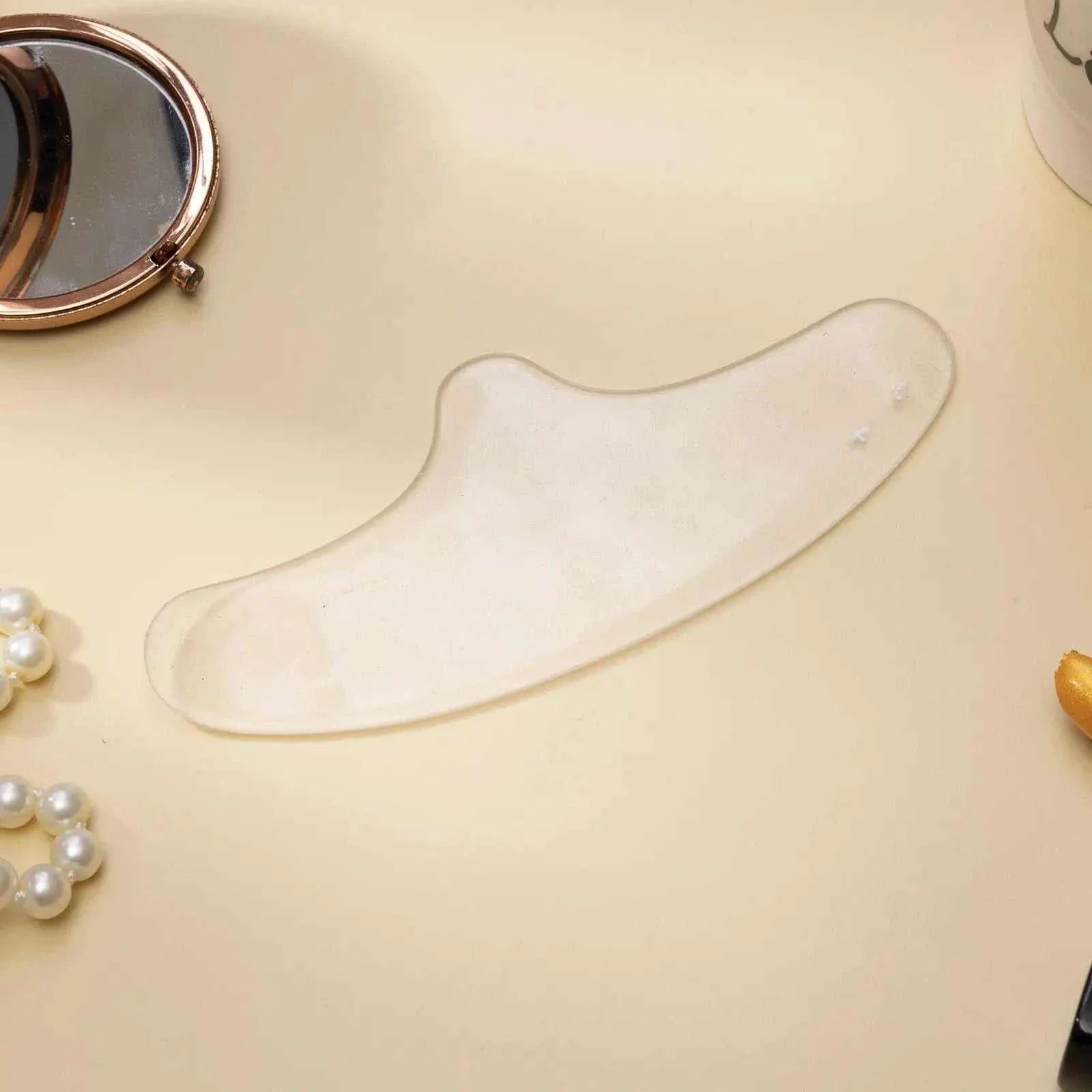 Reusable anti-wrinkle forehead patch made of soft medical-grade silicone for smoothing fine lines and wrinkles.