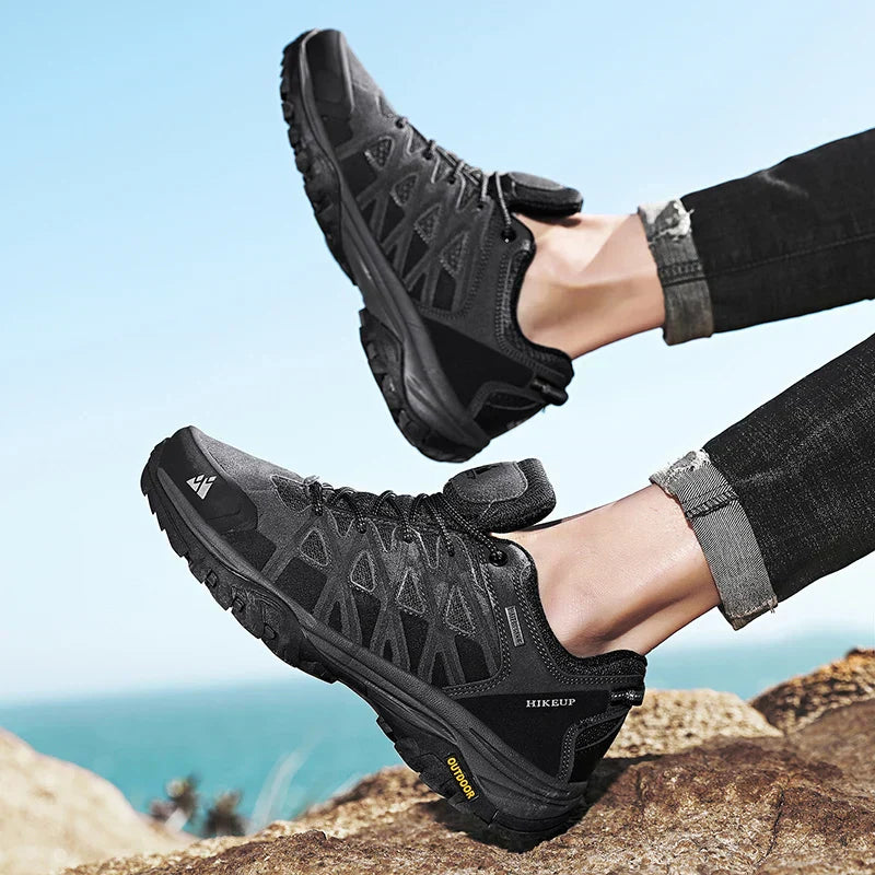 Black men's hiking shoes with durable design and high-traction soles for rugged outdoor use