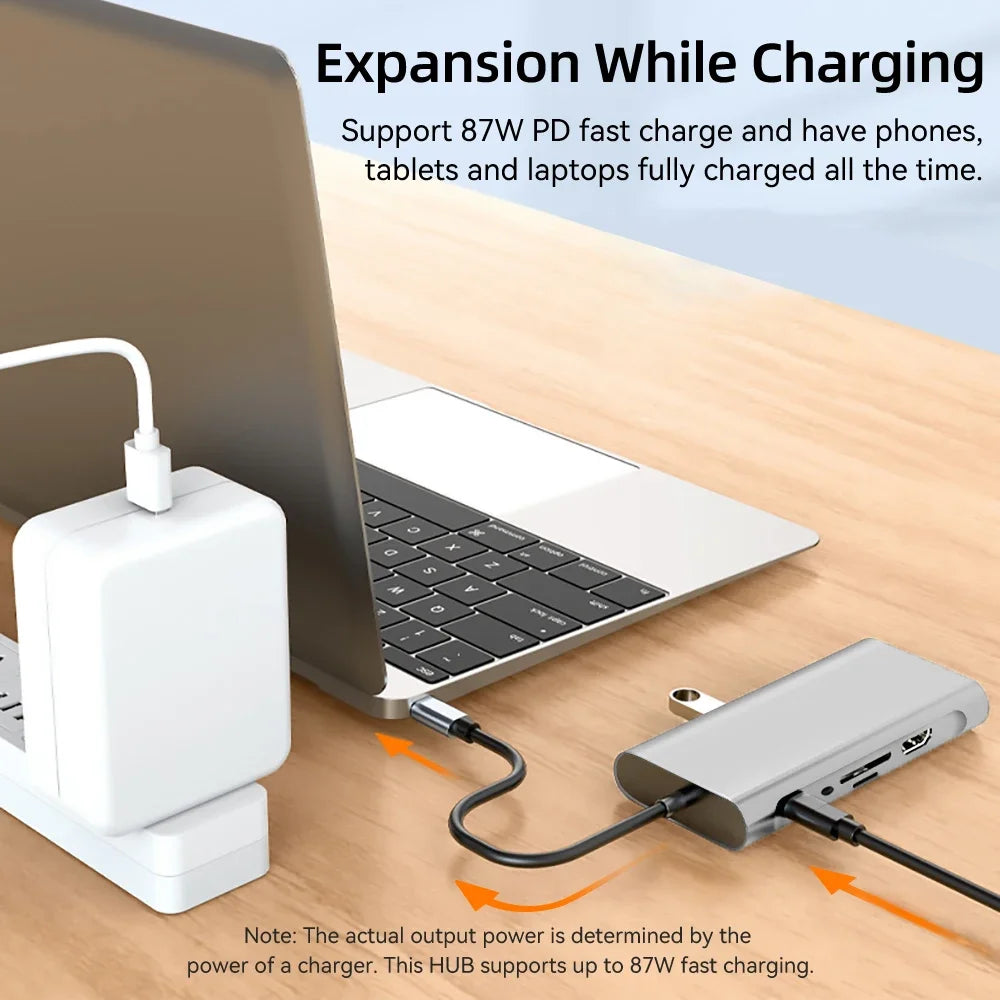 11-in-1 USB-C docking station connected to laptop with power delivery charging and multiple device connectivity ports