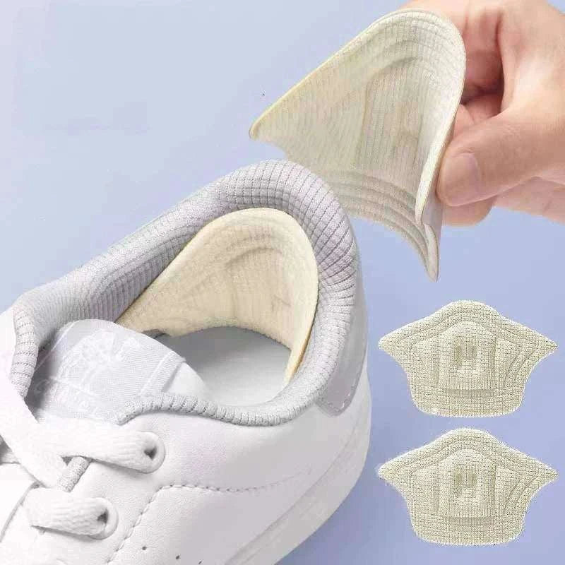Soft beige heel cushion pads with adhesive backing for shoe heel comfort and protection