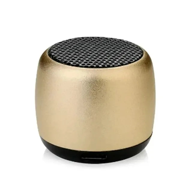Compact gold M1 Portable Bluetooth Speaker with 360° stereo sound and built-in microphone