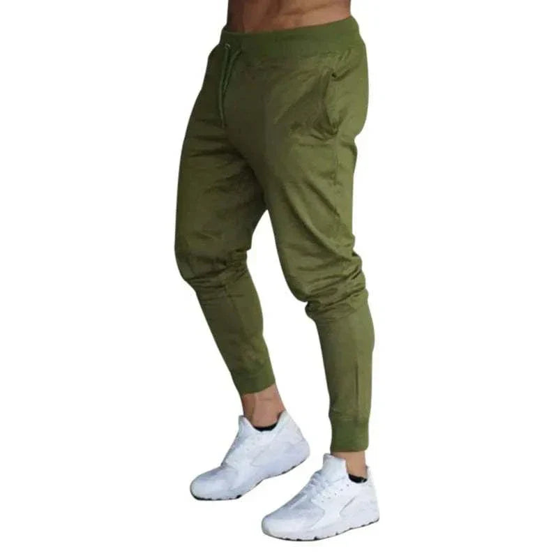 Men's Training Jogger Sweatpants in olive green with tapered fit and elastic waistband for workout and casual wear