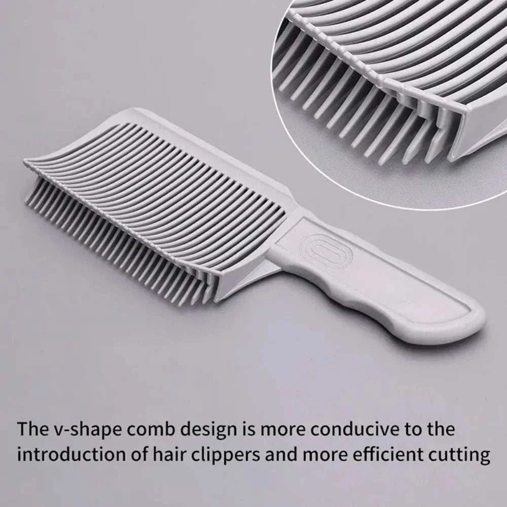 Gray barber fade comb with V-shaped teeth design for precise fades and flat top haircuts, ergonomic handle for comfortable grip, heat-resistant and lightweight hair cutting tool.