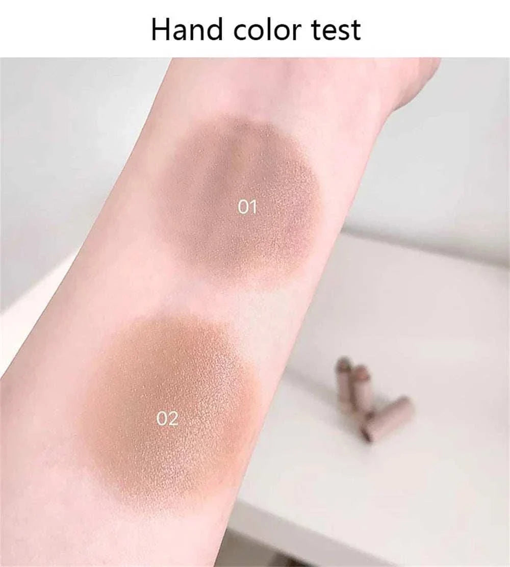 Swatches of two shades of moisturizing matte concealer contour stick on arm showing smooth, blendable, waterproof formula