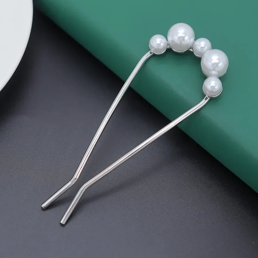 Elegant Pearl U-Shaped Hairpin with metallic shell design for secure bun styling