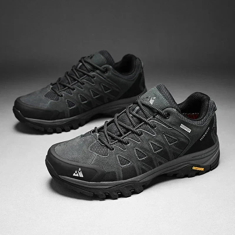 Men's Hiking Shoes in black with durable construction, breathable design, and high-traction soles for all-terrain outdoor adventures.