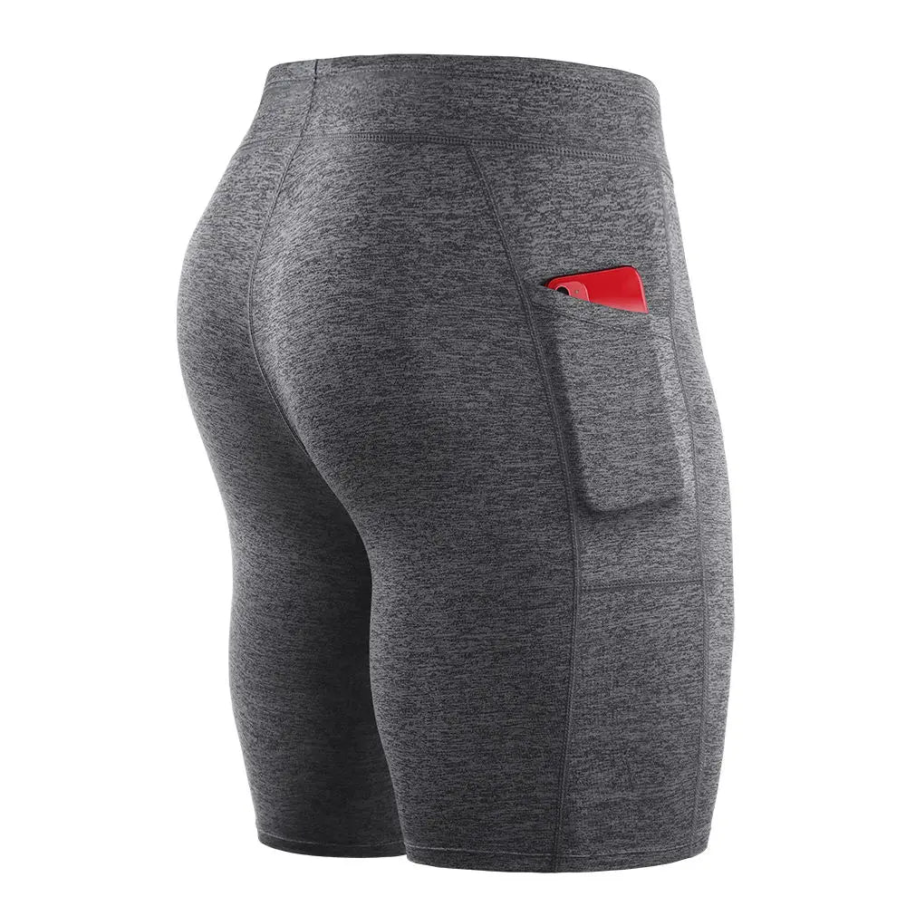 Gray men's outdoor running shorts with side pocket holding a red phone, made of breathable, stretchy fabric with compression leggings.