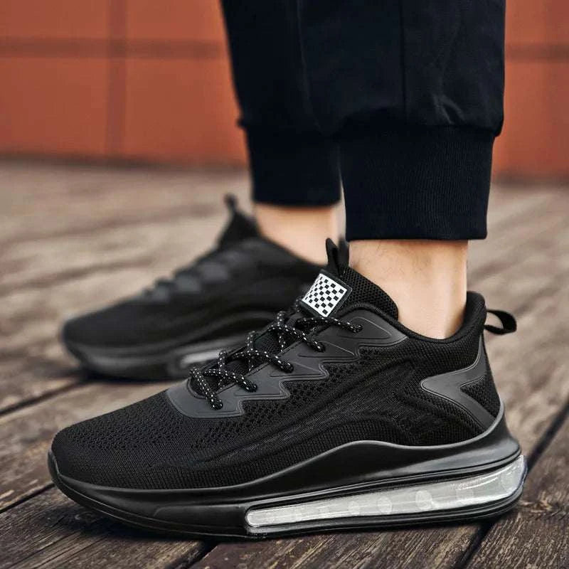 Black breathable unisex sneaker with vulcanized rubber sole and air cushion for lightweight comfort and secure fit