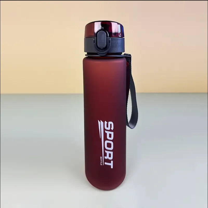 BPA-Free leak-proof sports water bottle with secure lid and carry strap, ideal for hiking and fitness.