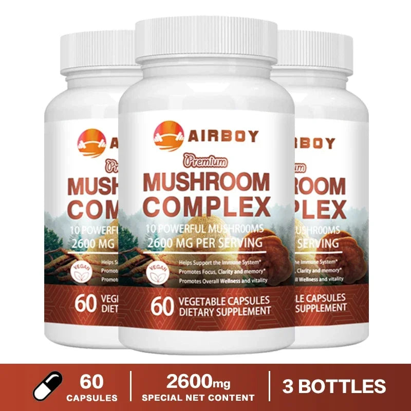 Three bottles of Airboy Premium Mushroom Complex Capsules dietary supplement with 60 vegan vegetable capsules each, featuring 2600 mg of 10 powerful mushrooms per serving for brain support, energy, and immune health.